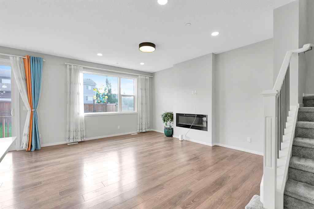 MLS® A2263068 - 106 Lucas Crescent NW in Livingston Calgary, Residential