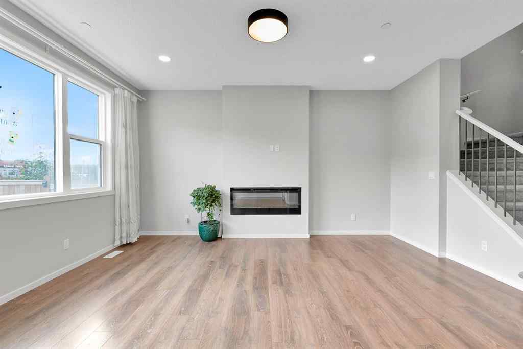 MLS® A2263068 - 106 Lucas Crescent NW in Livingston Calgary, Residential