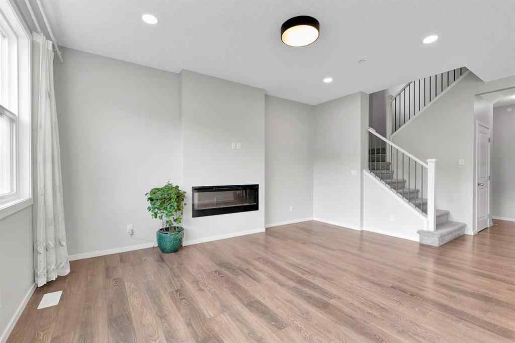 MLS® A2263068 - 106 Lucas Crescent NW in Livingston Calgary, Residential