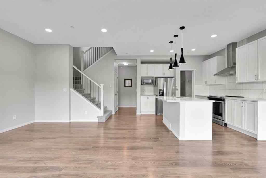 MLS® A2263068 - 106 Lucas Crescent NW in Livingston Calgary, Residential