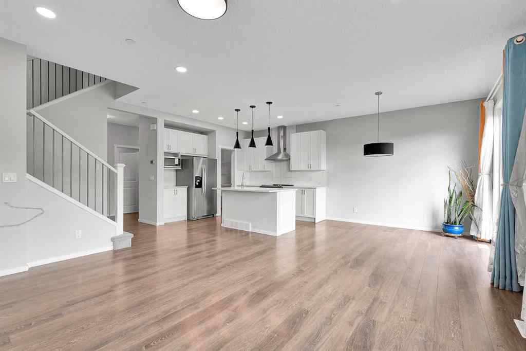 MLS® A2263068 - 106 Lucas Crescent NW in Livingston Calgary, Residential