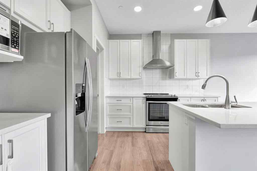 MLS® A2263068 - 106 Lucas Crescent NW in Livingston Calgary, Residential