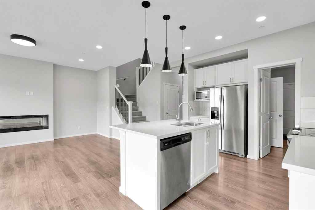 MLS® A2263068 - 106 Lucas Crescent NW in Livingston Calgary, Residential