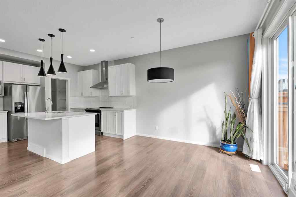 MLS® A2263068 - 106 Lucas Crescent NW in Livingston Calgary, Residential