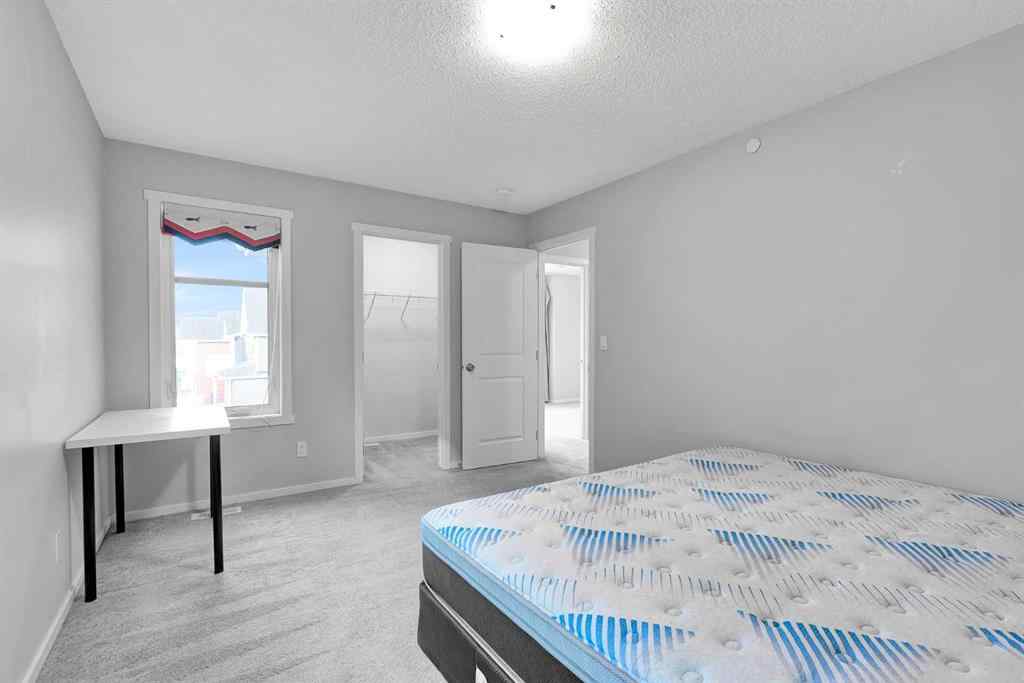 MLS® A2263068 - 106 Lucas Crescent NW in Livingston Calgary, Residential