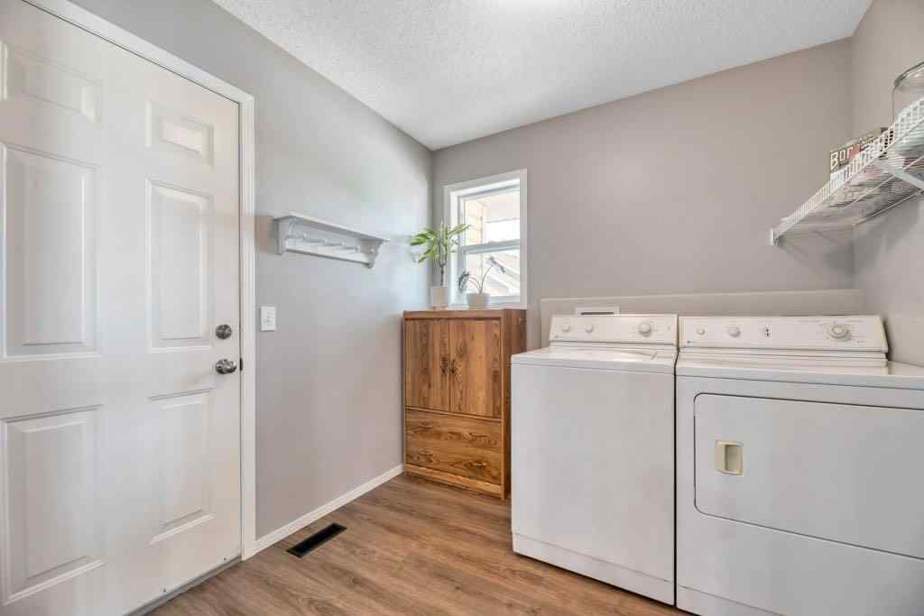 MLS® A2263078 - 15 Henderson Bay NE in NONE Langdon, Residential