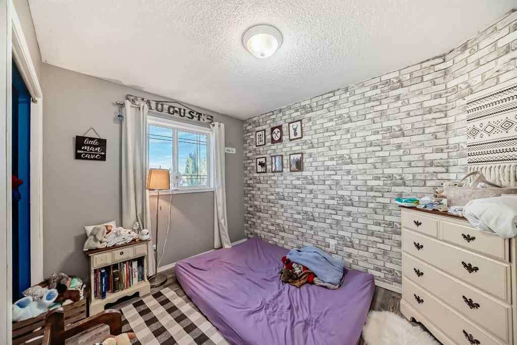 MLS® A2263092 - 124 Creek Gardens Close NW in Silver Creek Airdrie, Residential