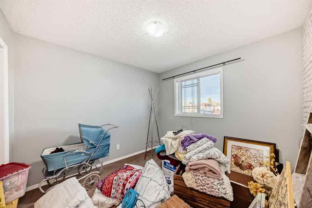 MLS® A2263092 - 124 Creek Gardens Close NW in Silver Creek Airdrie, Residential