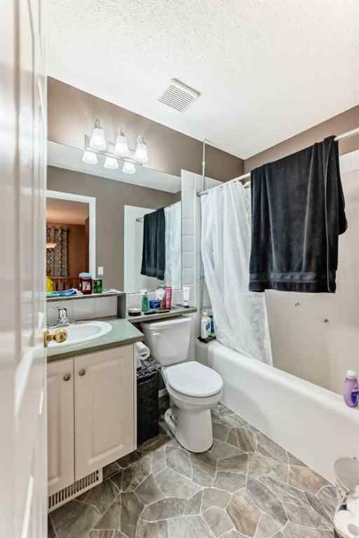 MLS® A2263092 - 124 Creek Gardens Close NW in Silver Creek Airdrie, Residential