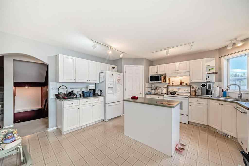 MLS® A2263092 - 124 Creek Gardens Close NW in Silver Creek Airdrie, Residential