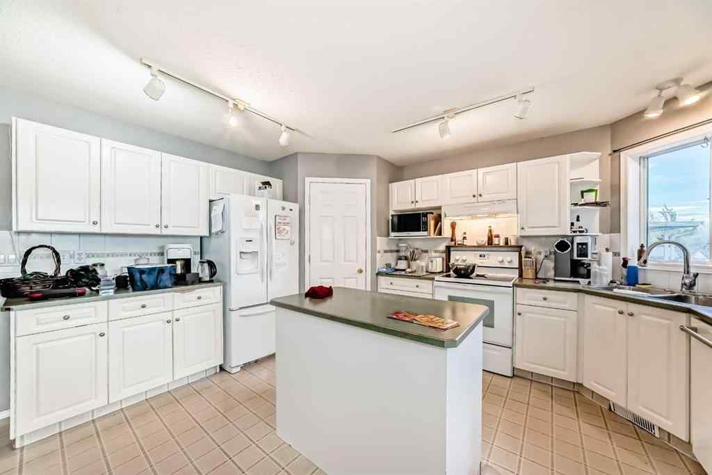 MLS® A2263092 - 124 Creek Gardens Close NW in Silver Creek Airdrie, Residential