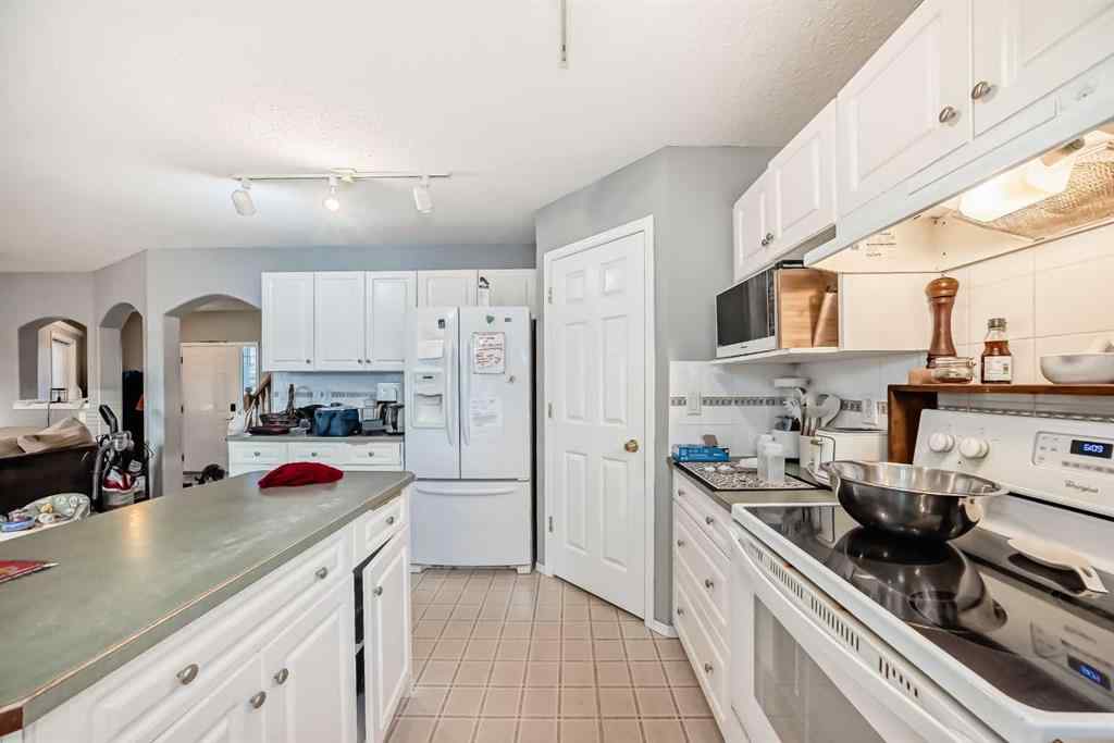 MLS® A2263092 - 124 Creek Gardens Close NW in Silver Creek Airdrie, Residential