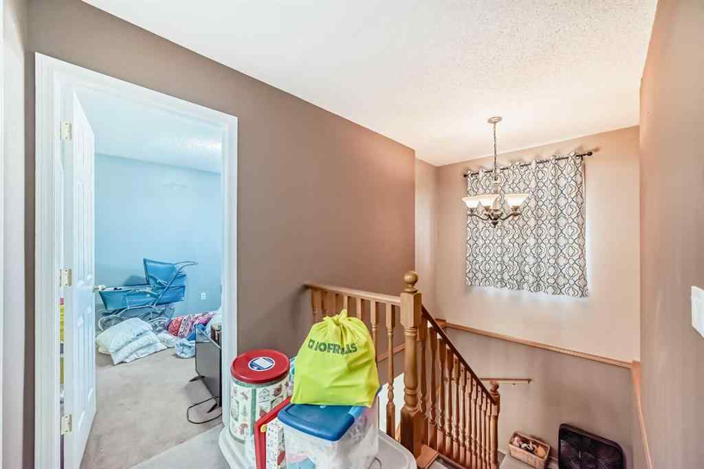 MLS® A2263092 - 124 Creek Gardens Close NW in Silver Creek Airdrie, Residential