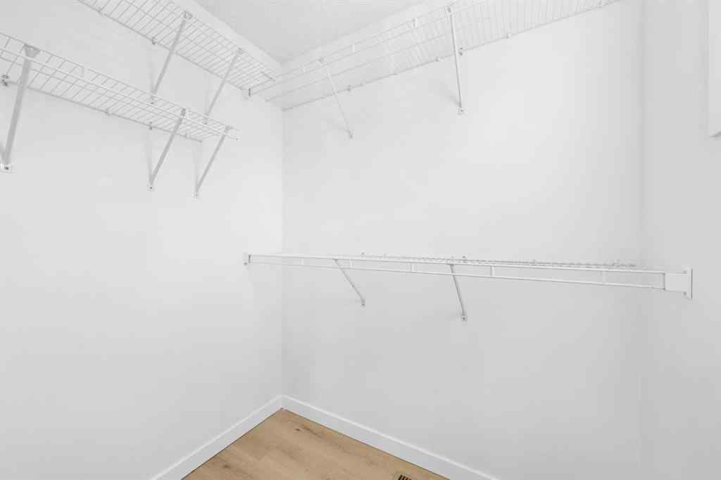 MLS® A2263097 - 18 Panatella Park NW in Panorama Hills Calgary, Residential