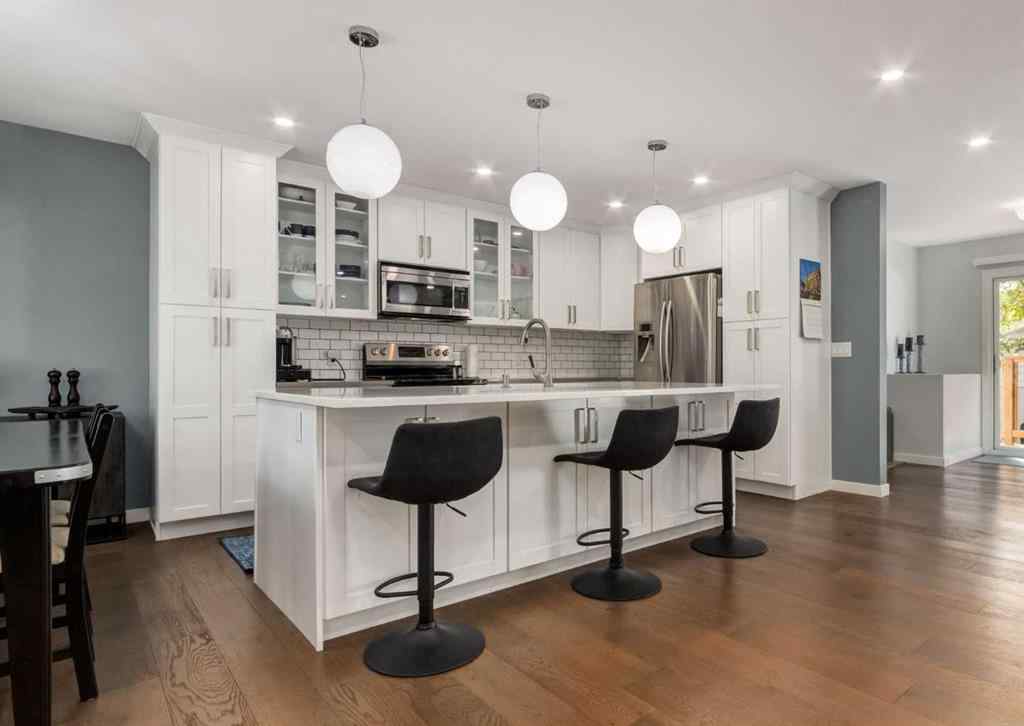 MLS® A2263101 - 927 124 Avenue SW in Canyon Meadows Calgary, Residential