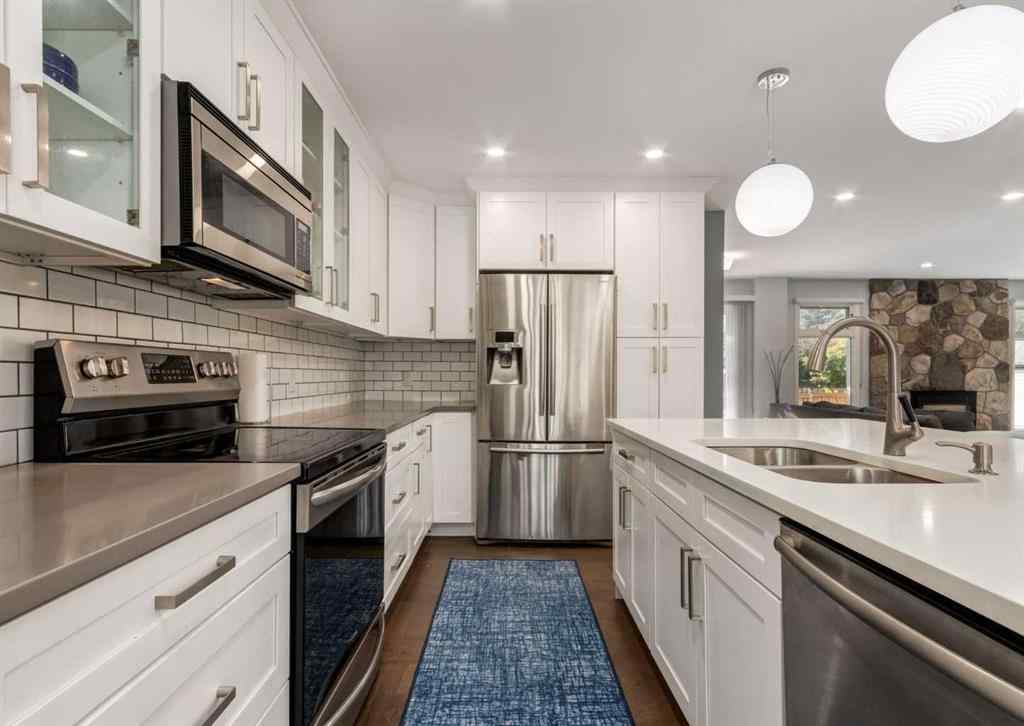 MLS® A2263101 - 927 124 Avenue SW in Canyon Meadows Calgary, Residential