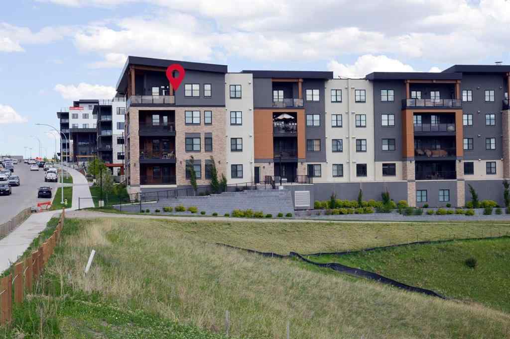 MLS® A2263109 - Unit #415 8355 19 Avenue SW in Springbank Hill Calgary, Residential