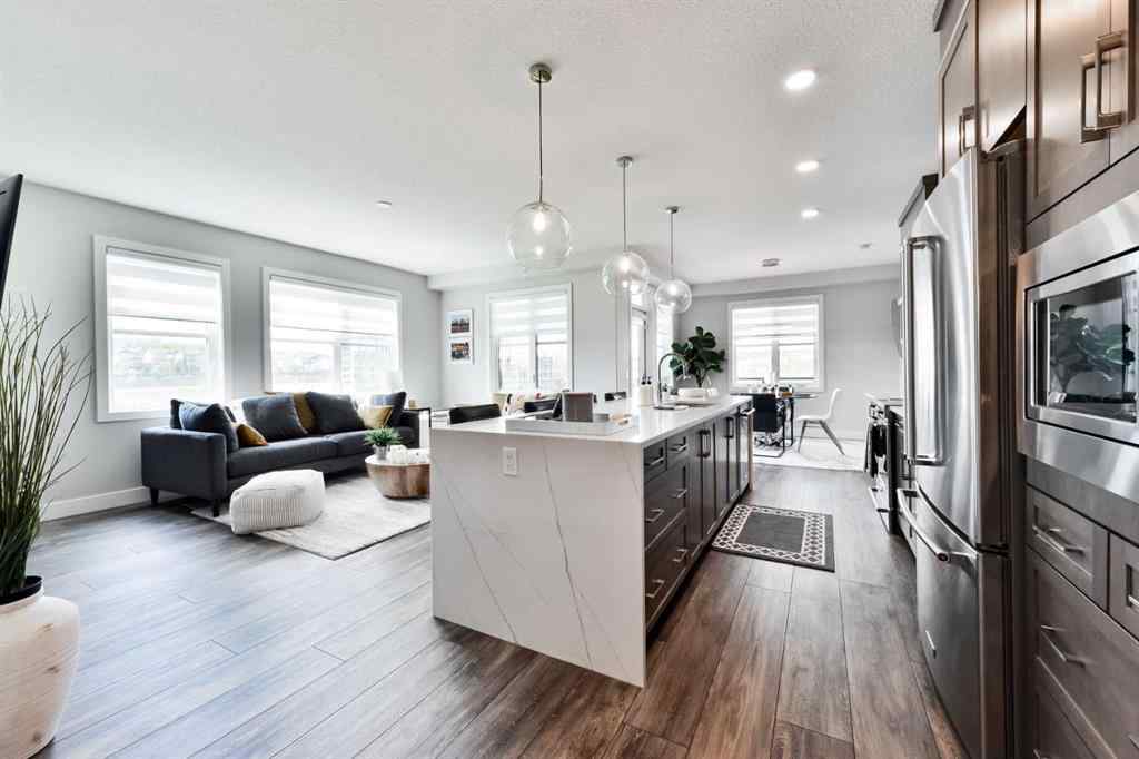 MLS® A2263109 - Unit #415 8355 19 Avenue SW in Springbank Hill Calgary, Residential