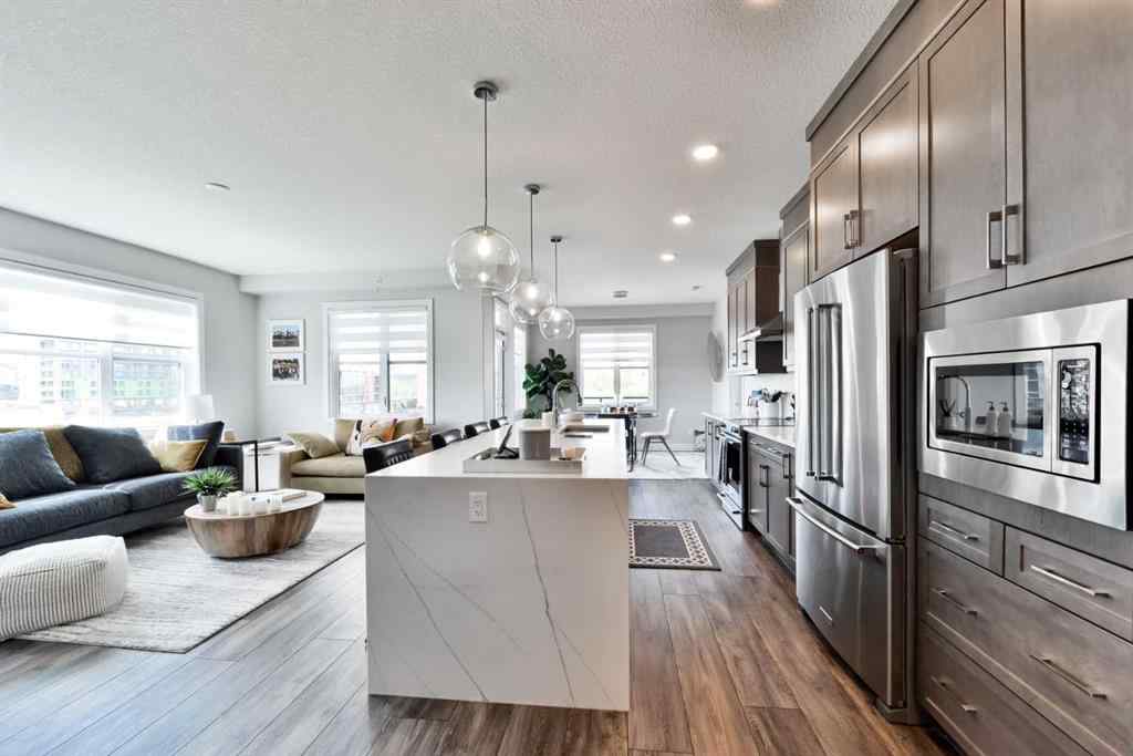 MLS® A2263109 - Unit #415 8355 19 Avenue SW in Springbank Hill Calgary, Residential