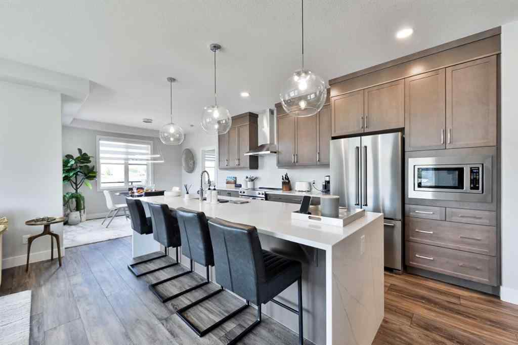 MLS® A2263109 - Unit #415 8355 19 Avenue SW in Springbank Hill Calgary, Residential