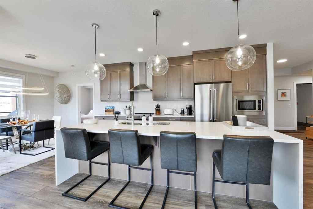 MLS® A2263109 - Unit #415 8355 19 Avenue SW in Springbank Hill Calgary, Residential