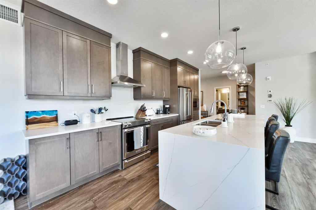 MLS® A2263109 - Unit #415 8355 19 Avenue SW in Springbank Hill Calgary, Residential