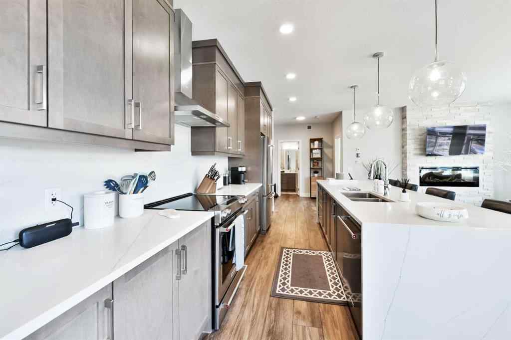 MLS® A2263109 - Unit #415 8355 19 Avenue SW in Springbank Hill Calgary, Residential