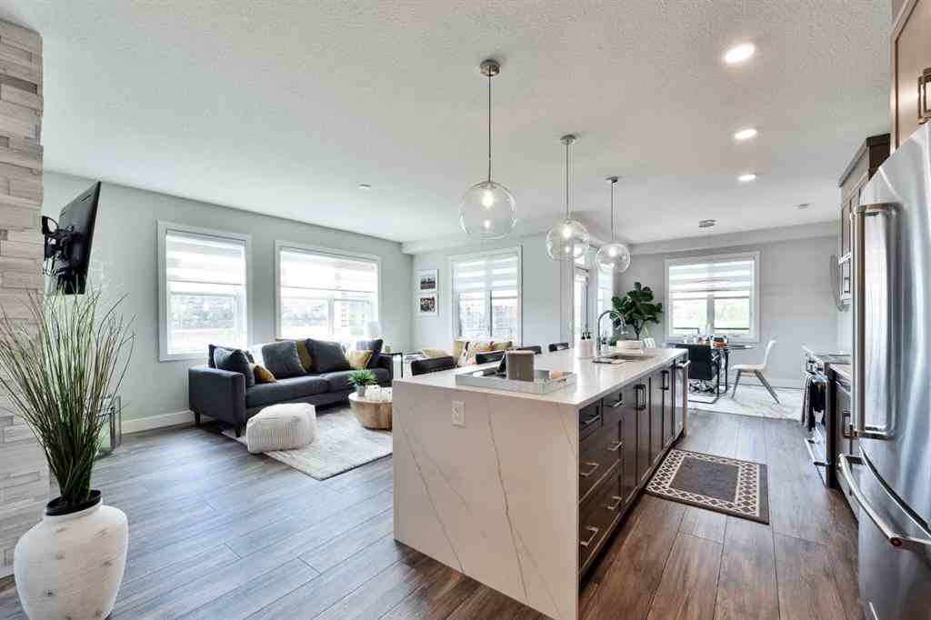 MLS® A2263109 - Unit #415 8355 19 Avenue SW in Springbank Hill Calgary, Residential