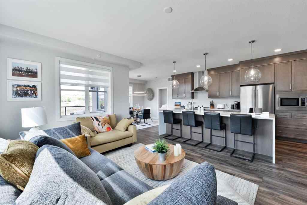 MLS® A2263109 - Unit #415 8355 19 Avenue SW in Springbank Hill Calgary, Residential