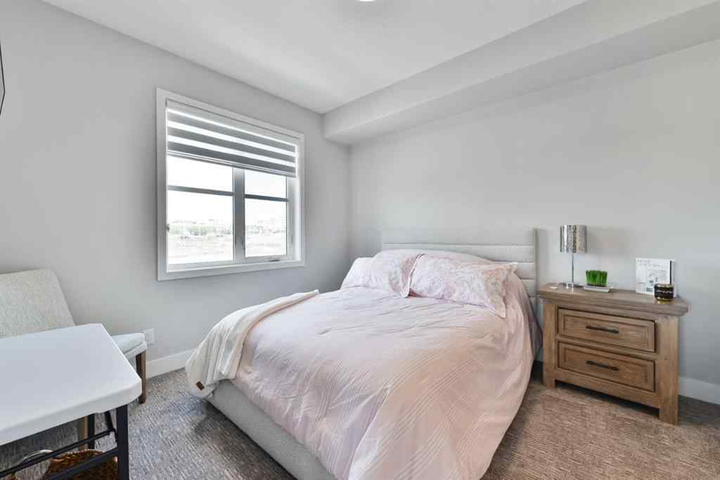 MLS® A2263109 - Unit #415 8355 19 Avenue SW in Springbank Hill Calgary, Residential