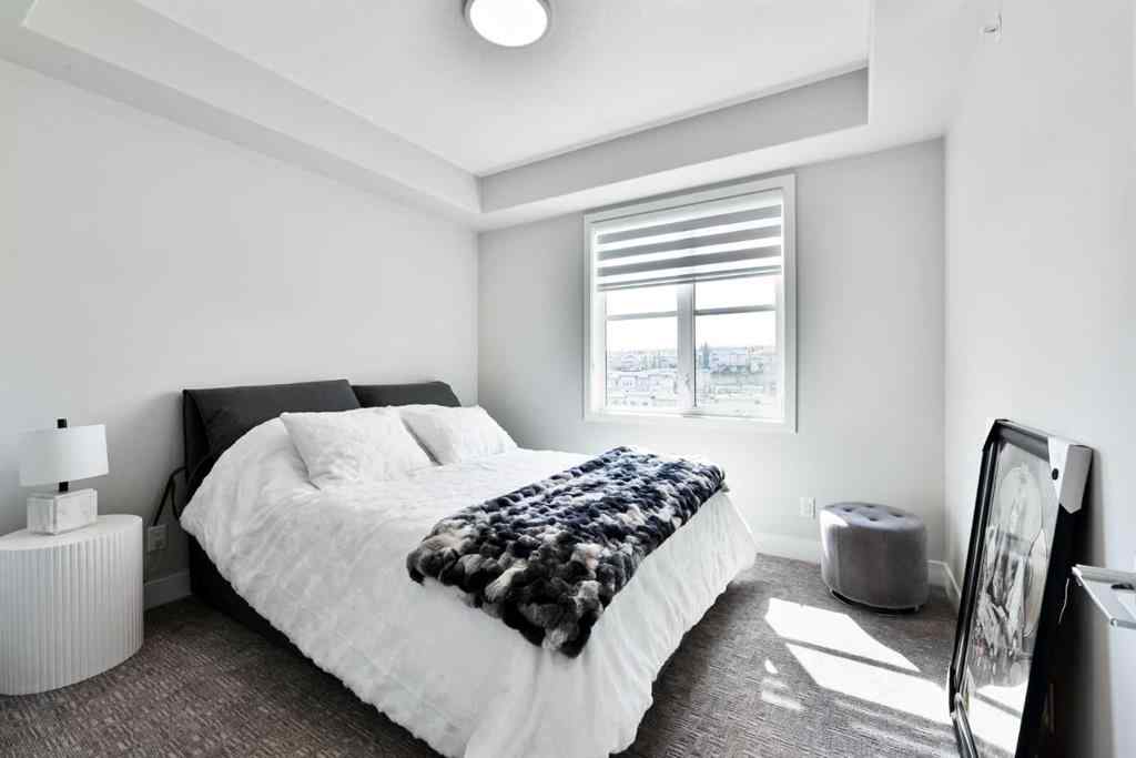 MLS® A2263109 - Unit #415 8355 19 Avenue SW in Springbank Hill Calgary, Residential