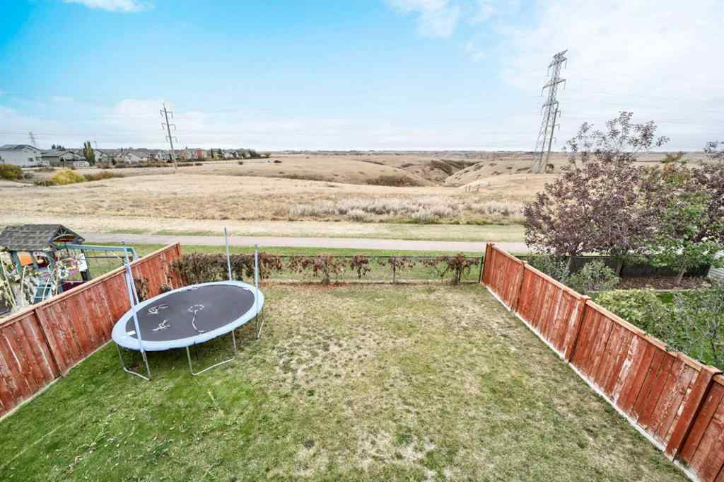 MLS® A2263112 - 60 Alma Isobell Hodder Crescent N in Legacy Ridge / Hardieville Lethbridge, Residential