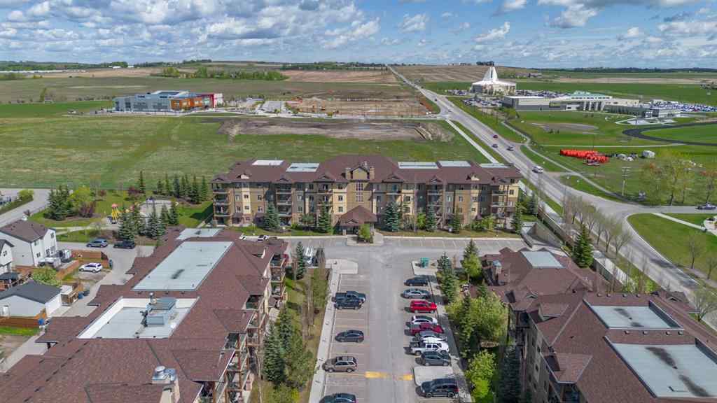 MLS® A2263113 - Unit #4214 92 Crystal Shores Road  in Crystal Shores Okotoks, Residential
