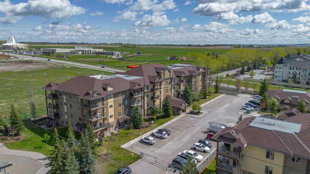 MLS® A2263113 - Unit #4214 92 Crystal Shores Road  in Crystal Shores Okotoks, Residential