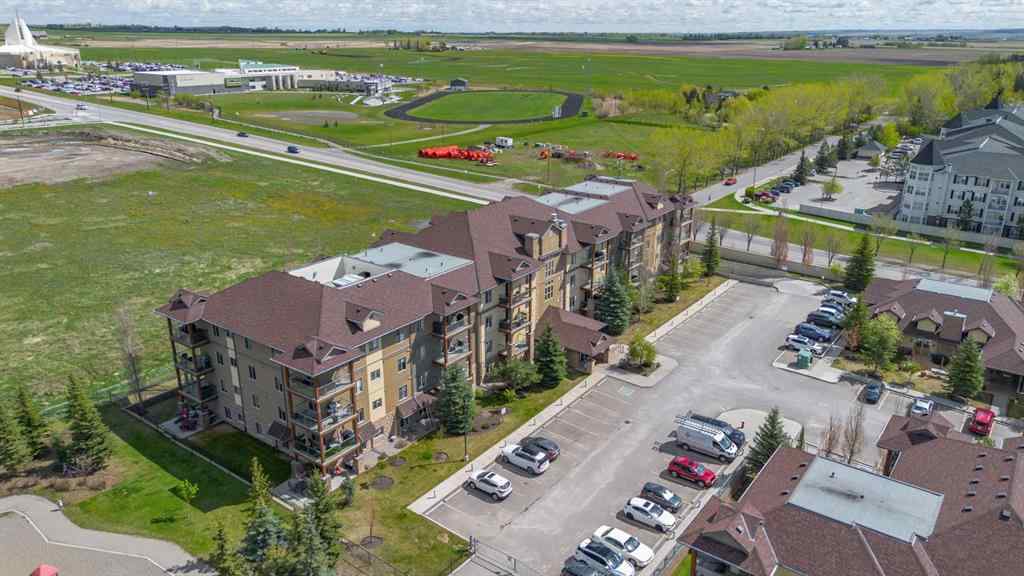 MLS® A2263113 - Unit #4214 92 Crystal Shores Road  in Crystal Shores Okotoks, Residential