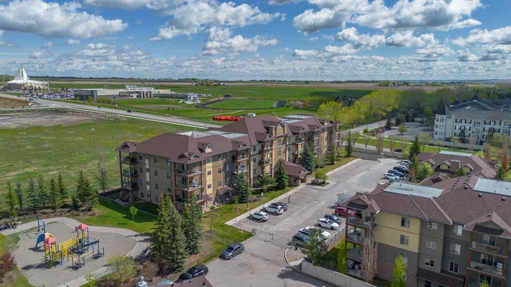 MLS® A2263113 - Unit #4214 92 Crystal Shores Road  in Crystal Shores Okotoks, Residential