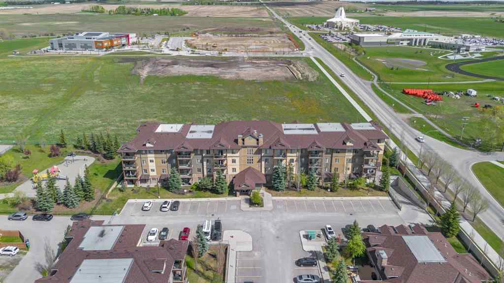 MLS® A2263113 - Unit #4214 92 Crystal Shores Road  in Crystal Shores Okotoks, Residential
