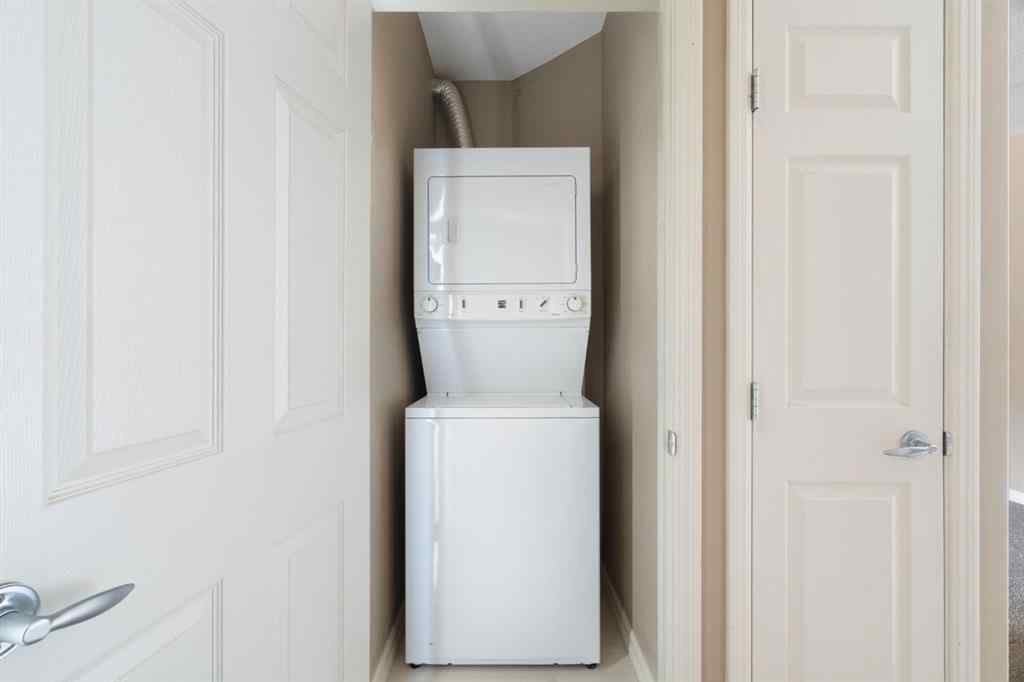 MLS® A2263113 - Unit #4214 92 Crystal Shores Road  in Crystal Shores Okotoks, Residential