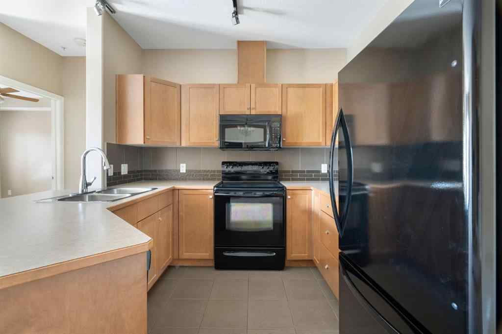 MLS® A2263113 - Unit #4214 92 Crystal Shores Road  in Crystal Shores Okotoks, Residential