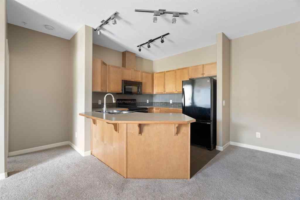 MLS® A2263113 - Unit #4214 92 Crystal Shores Road  in Crystal Shores Okotoks, Residential
