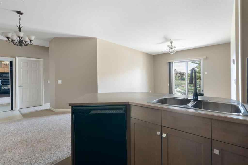 MLS® A2263113 - Unit #4214 92 Crystal Shores Road  in Crystal Shores Okotoks, Residential