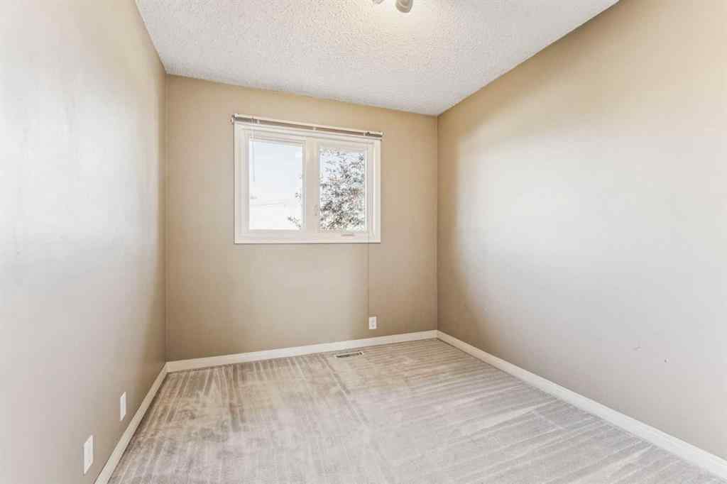 MLS® A2263125 - 1609 46 Street NW in Montgomery Calgary, Residential
