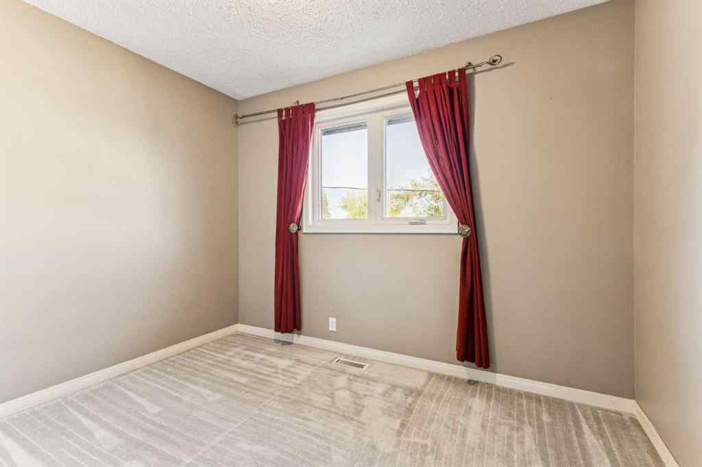 MLS® A2263125 - 1609 46 Street NW in Montgomery Calgary, Residential