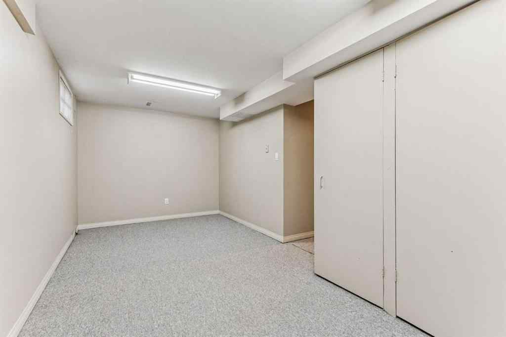 MLS® A2263125 - 1609 46 Street NW in Montgomery Calgary, Residential