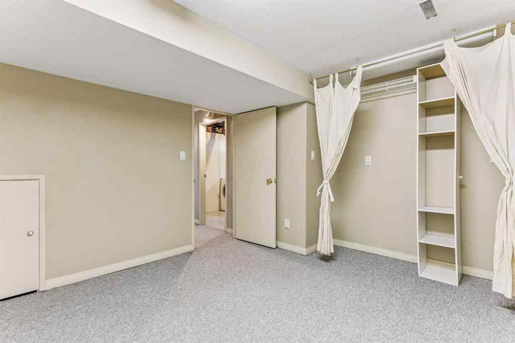 MLS® A2263125 - 1609 46 Street NW in Montgomery Calgary, Residential