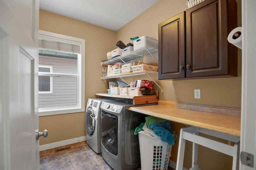 MLS® A2263147 - 42 Iron Wolf Court  in Iron Wolf Lacombe, Residential