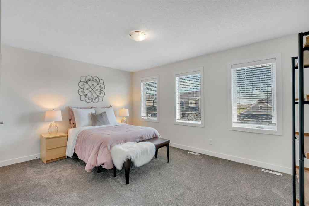 MLS® A2263179 - 2173 Ravensdun Crescent SE in Ravenswood Airdrie, Residential