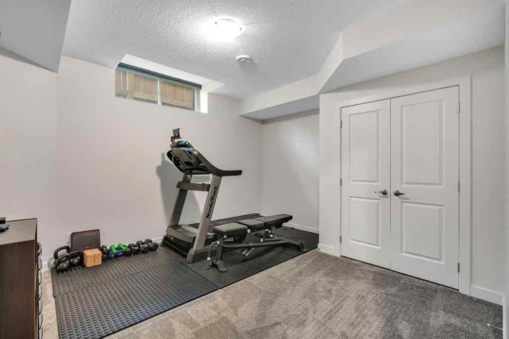 MLS® A2263179 - 2173 Ravensdun Crescent SE in Ravenswood Airdrie, Residential