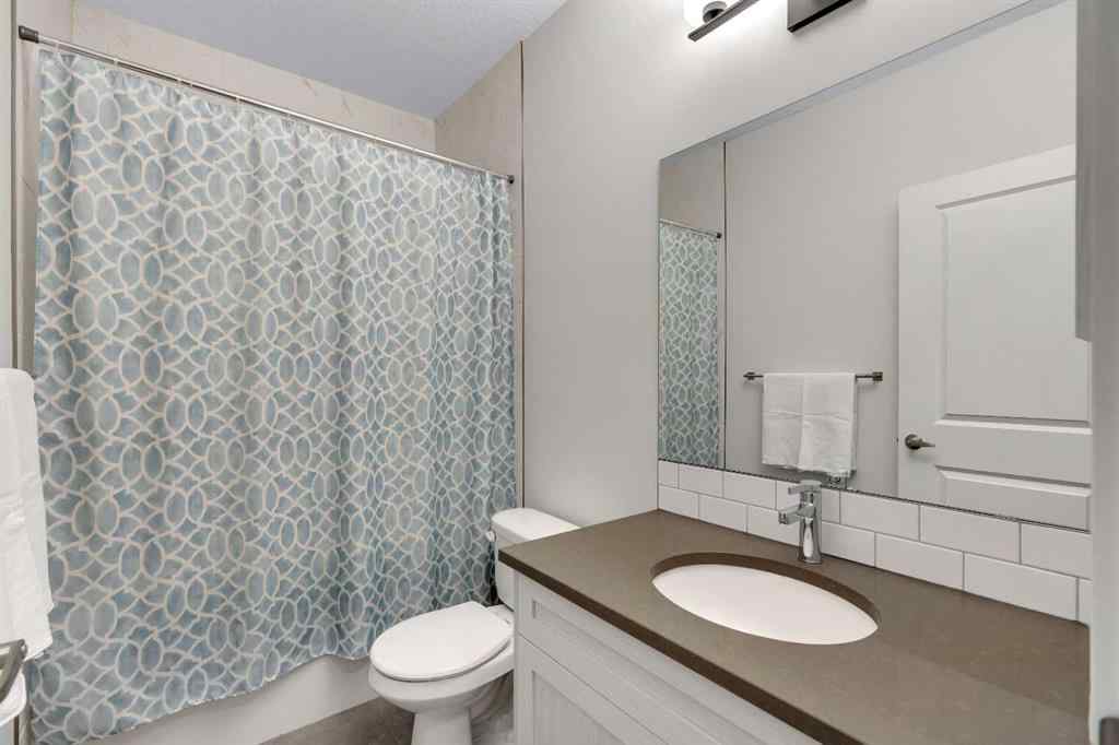 MLS® A2263179 - 2173 Ravensdun Crescent SE in Ravenswood Airdrie, Residential