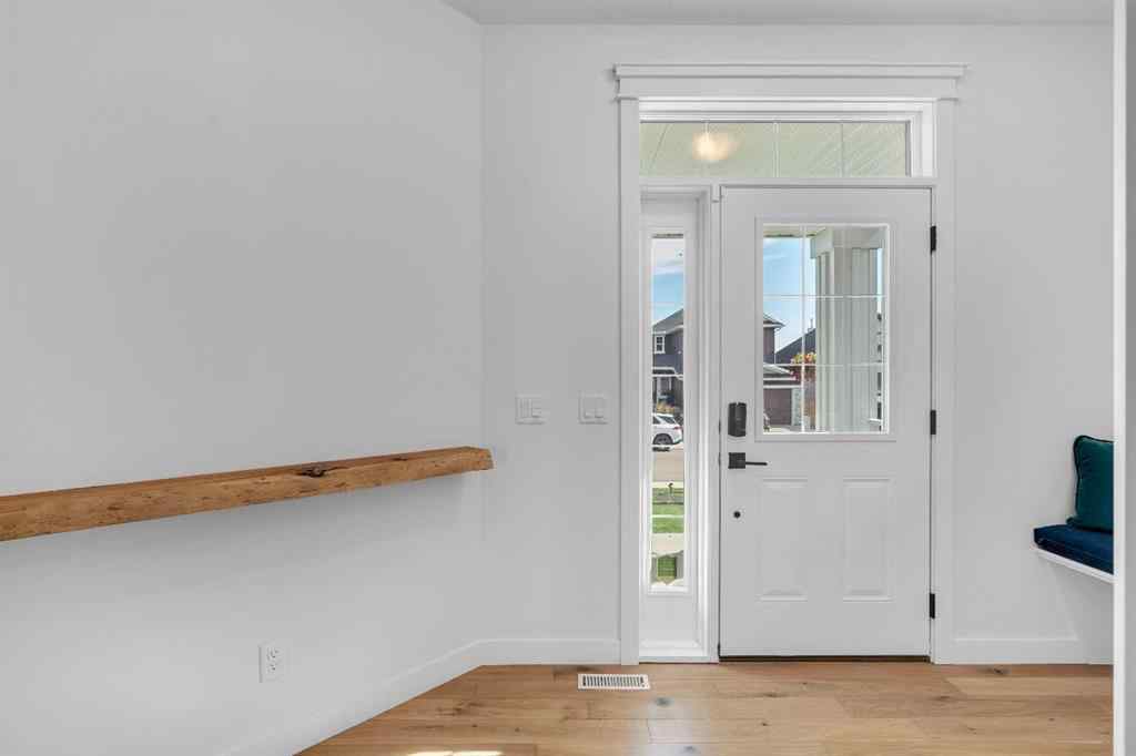 MLS® A2263179 - 2173 Ravensdun Crescent SE in Ravenswood Airdrie, Residential